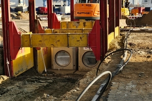  Einbau Doppelstrang-Kanäle DN 1000 mit TWF-Gleitschienenverbau 