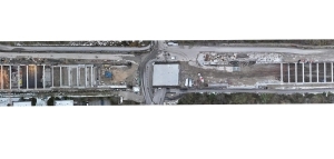  Per Drohnenüberflug erstellte Orthofotos wie dieses ermöglichen den maßstabsgetreuen Abgleich des Ist-Zustands mit der Ausführungsplanung. Links sieht man den entstehenden U-Bahnhof Martinsried, rechts die Anschlussstelle Großhadern. In der Mitte liegt die Straße am Klopferspitz 