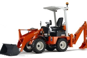  Der R310, hier mit angebautem Heckbagger, ist der kleinste Radlader von Kubota, er verfügt über 1,99 m Auskipphöhe und 0,75 m Reichweite 